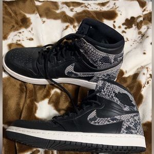 Women’s Nike Air Jordans. Size 8.5. Black with Snake Skin.